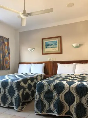 Cama o camas de una habitación en Hotel El Faro Malecon