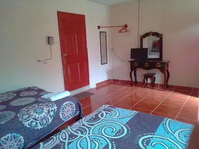 Cama o camas de una habitación en Hotel Cuaupatanini