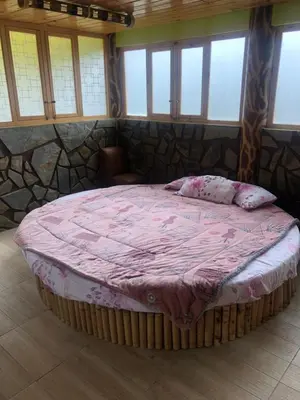 Cama o camas de una habitación en Rancho los Alebrijes Zacatlan