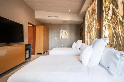 Cama o camas de una habitación en L Hotel Perla Boutique