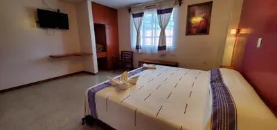Cama o camas de una habitación en Hotel Florida Oaxaca