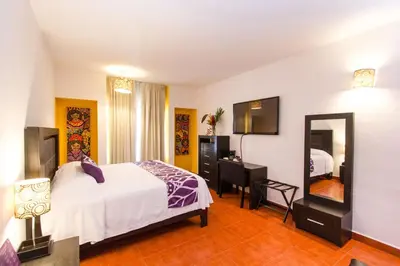 Cama o camas de una habitación en Hotel Santa Cruz Huatulco