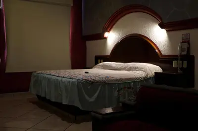 Cama o camas de una habitación en Motel Caribe