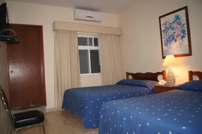 Cama o camas de una habitación en Hotel Veracruz