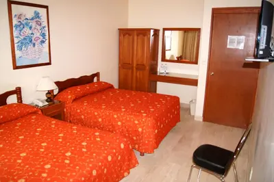 Cama o camas de una habitación en Hotel Veracruz