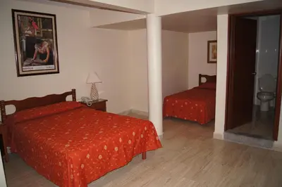 Cama o camas de una habitación en Hotel Veracruz