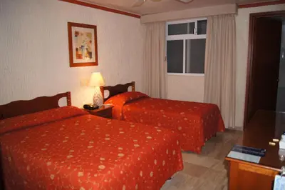 Cama o camas de una habitación en Hotel Veracruz