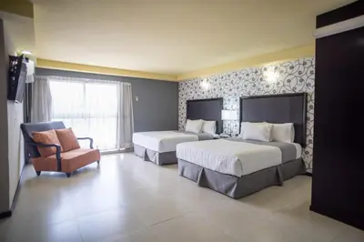 Cama o camas de una habitación en Hotel Ha