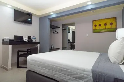 Cama o camas de una habitación en Hotel Ha