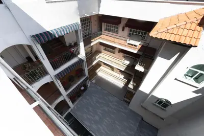 Un balcón o terraza de Boca Inn Hotel & Suites