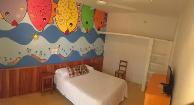 Cama o camas de una habitación en Casa De La Luz - Guesthouse