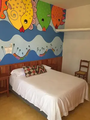 Cama o camas de una habitación en Casa De La Luz - Guesthouse
