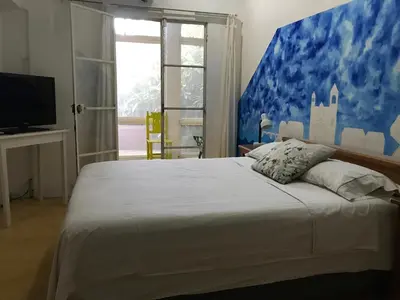 Cama o camas de una habitación en Casa De La Luz - Guesthouse
