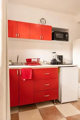 Una cocina o zona de cocina en Hermoso departamento en Oaxaca con estacionamiento
