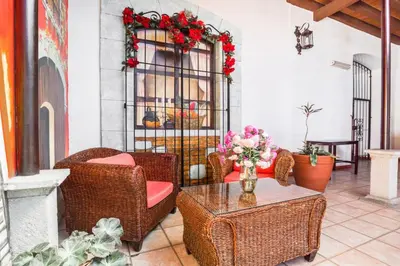 Zona de estar de Capital O El Nito Posada