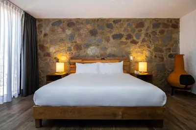 Cama o camas de una habitación en Hotel Boutique Camino Del Bosque
