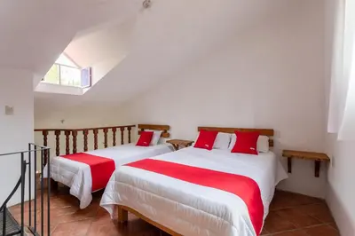 Cama o camas de una habitación en Hotel Paraje Casa Blanca