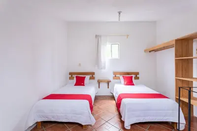Cama o camas de una habitación en Hotel Paraje Casa Blanca