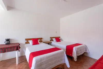 Cama o camas de una habitación en Hotel Paraje Casa Blanca
