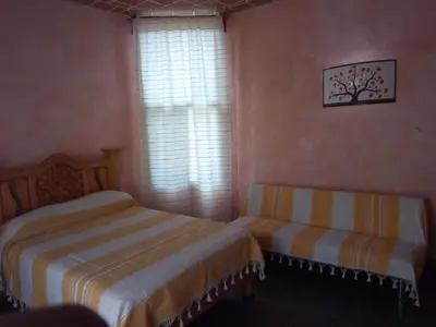 Cama o camas de una habitación en Hospedaje Casa Cortés - Recamaras de Descanso en Tepoztlán Mor