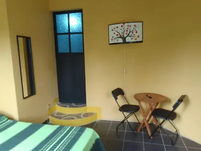 Cama o camas de una habitación en Hospedaje Casa Cortés - Recamaras de Descanso en Tepoztlán Mor