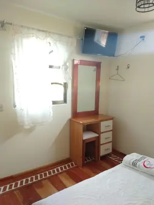 Cama o camas de una habitación en Hotel del Rosario