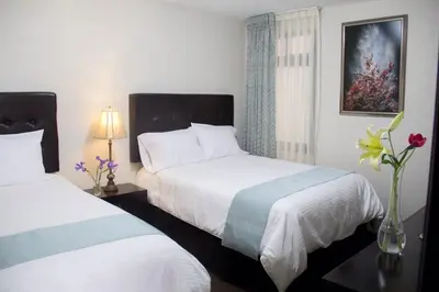 Cama o camas de una habitación en Hotel Nube Nueve