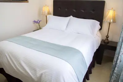 Cama o camas de una habitación en Hotel Nube Nueve