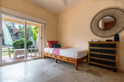 Cama o camas de una habitación en Rojo Manglar Acapulco