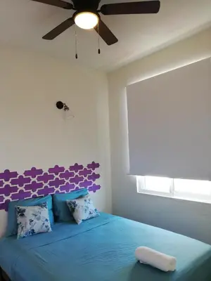 Cama o camas de una habitación en Casa Puerto Bonito, Aparthotel & Coworking