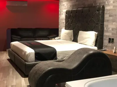Cama o camas de una habitación en Intimisimo Suites Autohotel Centro Only Adult