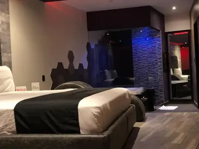 Cama o camas de una habitación en Intimisimo Suites Autohotel Centro Only Adult