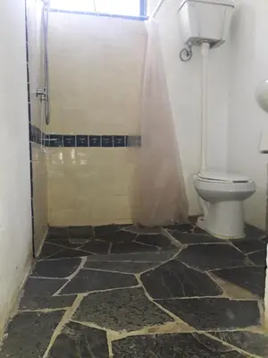 Un baño de Hospedaje Totalmanik