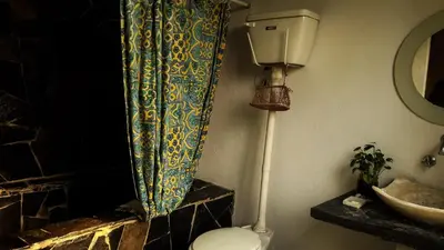 Un baño de Hospedaje Totalmanik