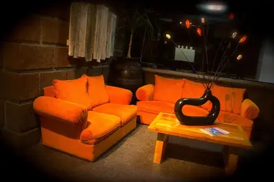 Zona de estar de Aztic Hotel and Executive Suites