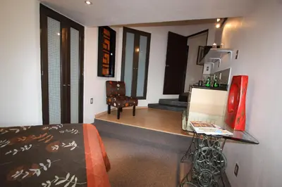 Zona de estar de Aztic Hotel and Executive Suites