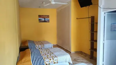 Cama o camas de una habitación en Hotel Villas Yoleth