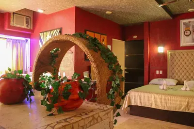 Cama o camas de una habitación en Villas y Suites Paraiso del Sur