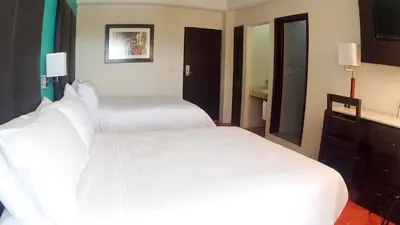 Cama o camas de una habitación en Hotel Santa Fe