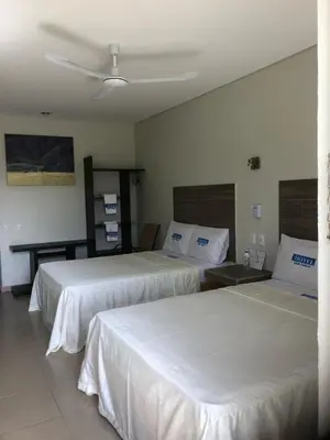 Cama o camas de una habitación en Hotel Guivá San Pablo