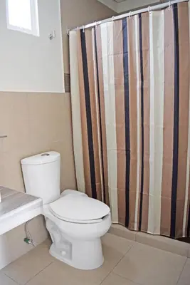 Un baño de Hotel Guivá San Pablo