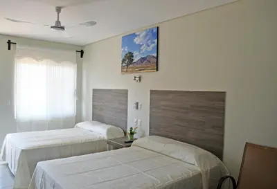 Cama o camas de una habitación en Hotel Guivá San Pablo