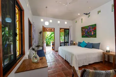 Cama o camas de una habitación en Hotel Villa Mozart y Macondo