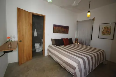 Cama o camas de una habitación en Hotel Villa Mozart y Macondo