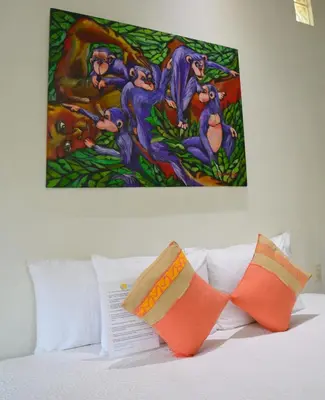 Cama o camas de una habitación en Hotel Villa Mozart y Macondo