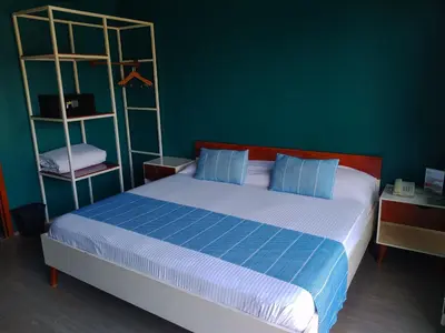 Cama o camas de una habitación en Hotel Momotus Tuxtla, en el centro - Acceso autónomo