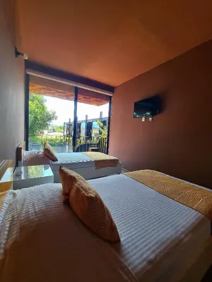 Cama o camas de una habitación en Hotel Momotus Tuxtla, en el centro - Acceso autónomo