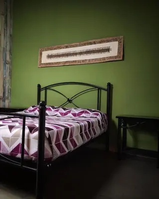Cama o camas de una habitación en Hotel el Descanso