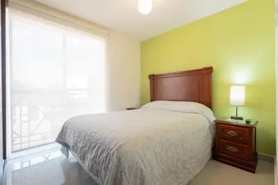 Cama o camas de una habitación en DEPARTAMENTO COMPLETO COYOACAN