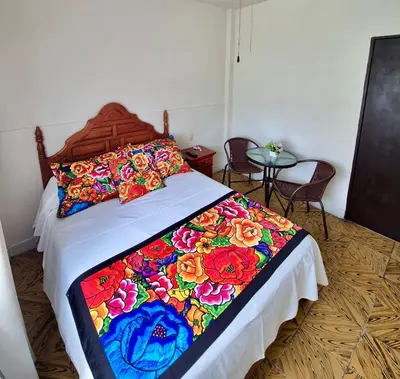 Cama o camas de una habitación en Hotel Catalina